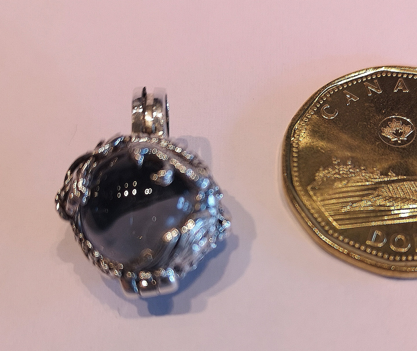 Quartz sphere in sterling silver dragon frame pendant