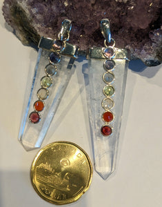 Clear optic quality quartz point pendant in sterling silver with seven chakra stones