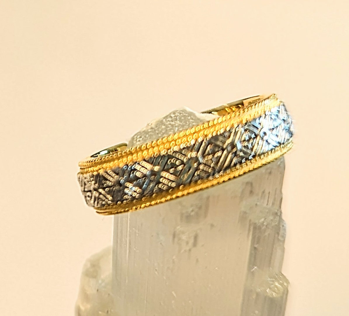 Adjustable sterling silver ring with gold plate and oxidized details