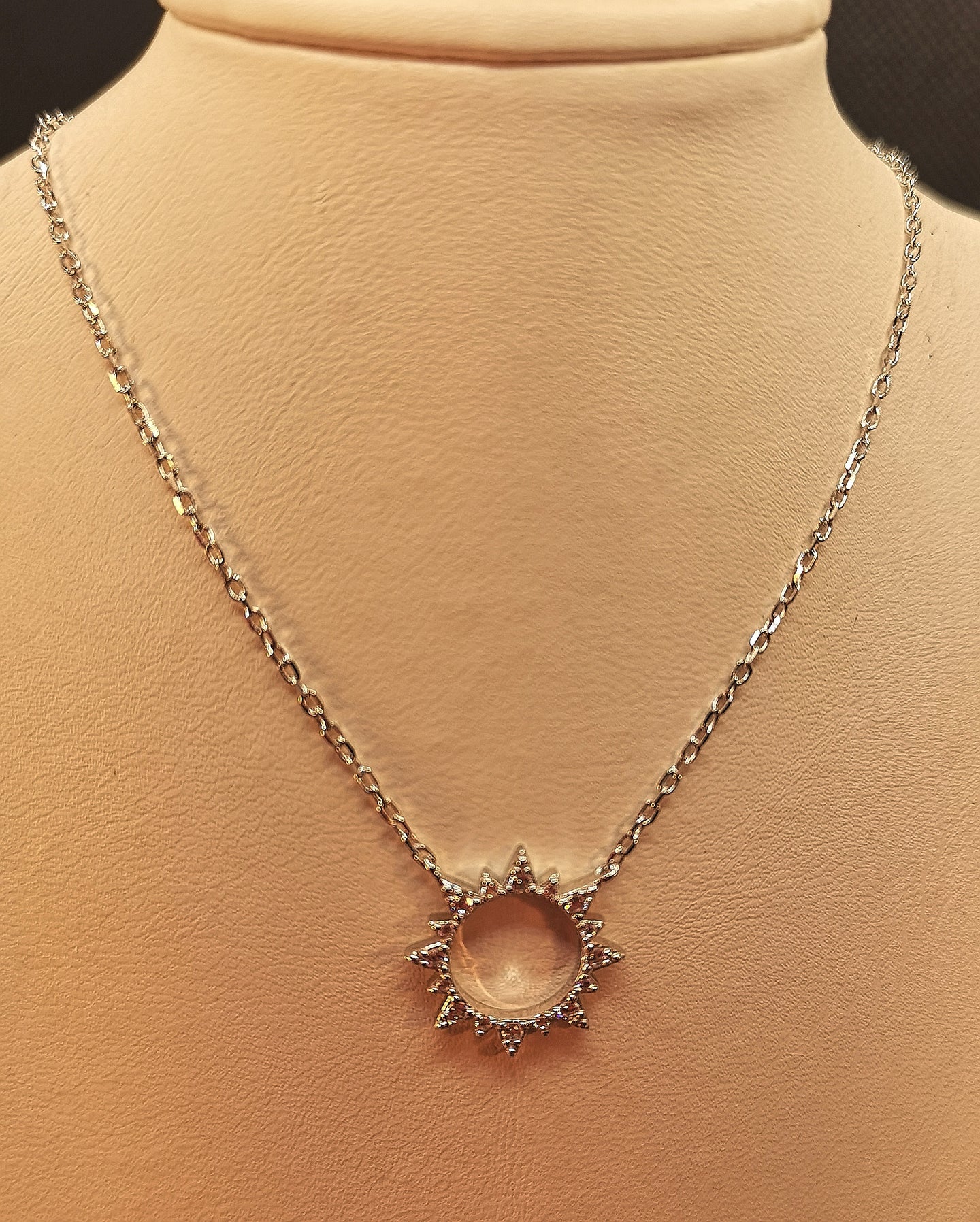 Sterling silver with rhodium finish necklace, cubic inlaid sun pendant