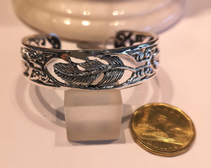 Spirit feather cuff bracelet in sterling silver.