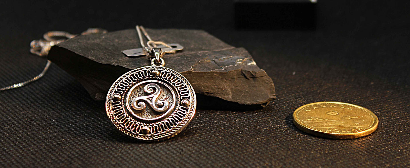 Triple spiral Celtic pendant in sterling silver