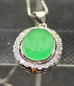 Genuine jade set in sterling silver with rhodium finish and micro-set cubic
