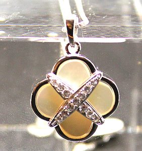 Mother of pearl 4 leaf clover pendant in sterling silver with rhodium finish and cubic