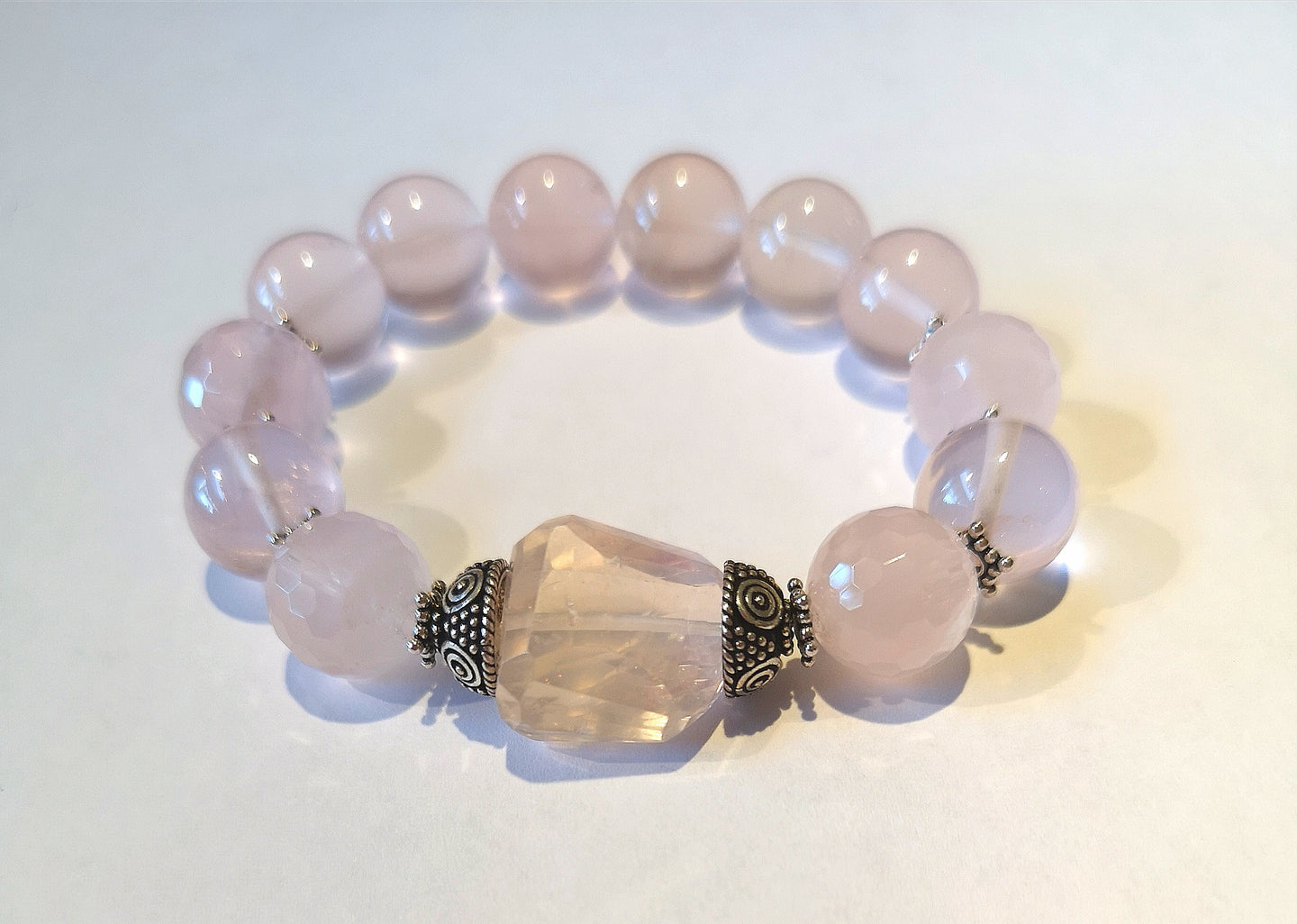 Rose quartz elastic bracelet with sterling silver beads