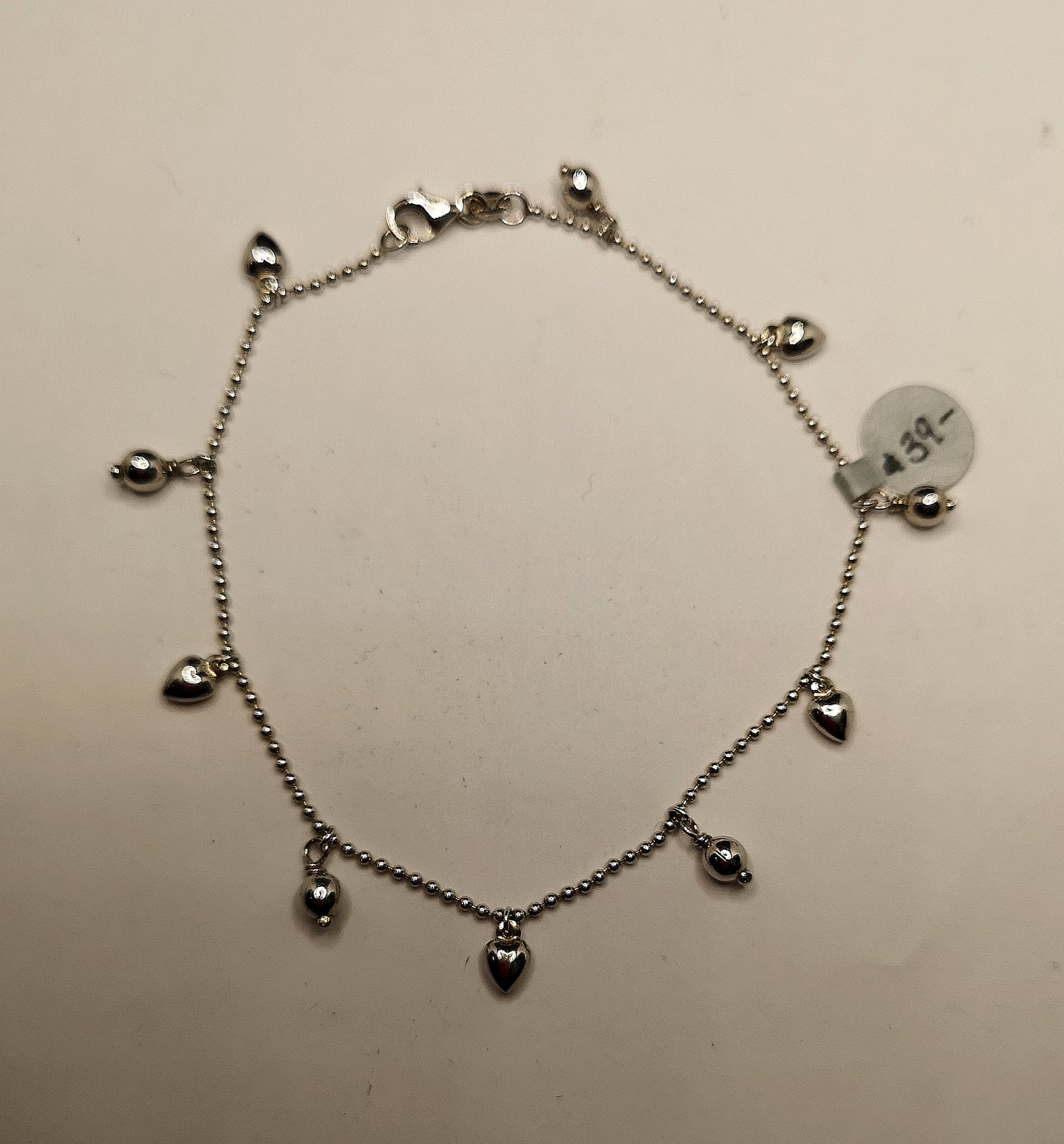 Sterling silver anklet with rhodium finish, heart and ball charms