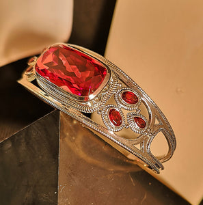 Garnet and red quartz center stone cuff bracelet in sterling silver