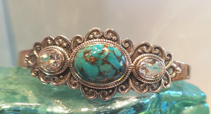 Genuine turquoise cuff bracelet in sterling silver with white topaz