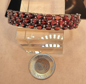 Garnet cuff bracelet with hinge opening in sterling silver