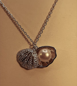 Pearl in oyster sterling silver necklace with rhodium finish and cubic