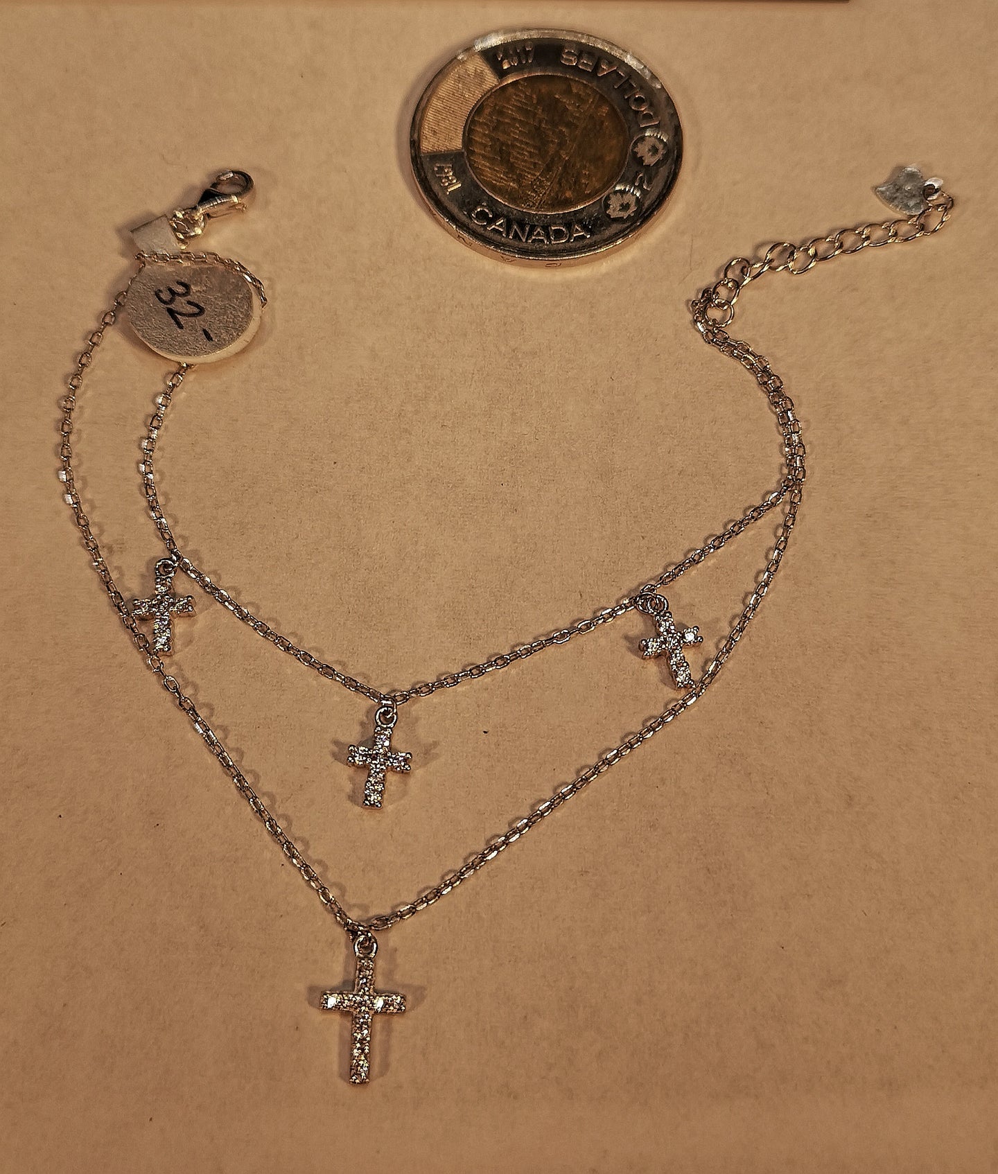 Sterling silver with rhodium finish and cubic cross bracelet