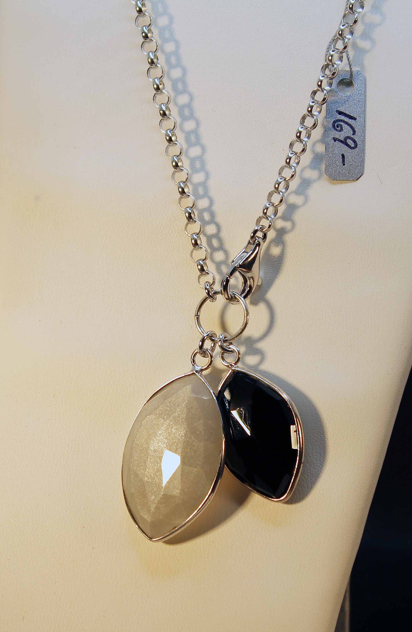 Sterling silver, rhodium finish necklace with grey moonstone and black onyx pendants